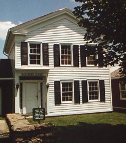 Warner House, two story white house.