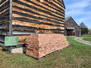 Wood next to Hartmann's Dorf building.