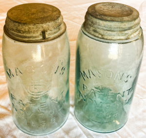 Two Clear Mason Jars.