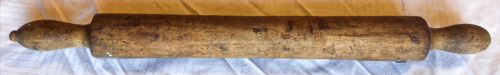 Wooden roller with handles.