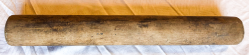 Wooden roller, no handles.