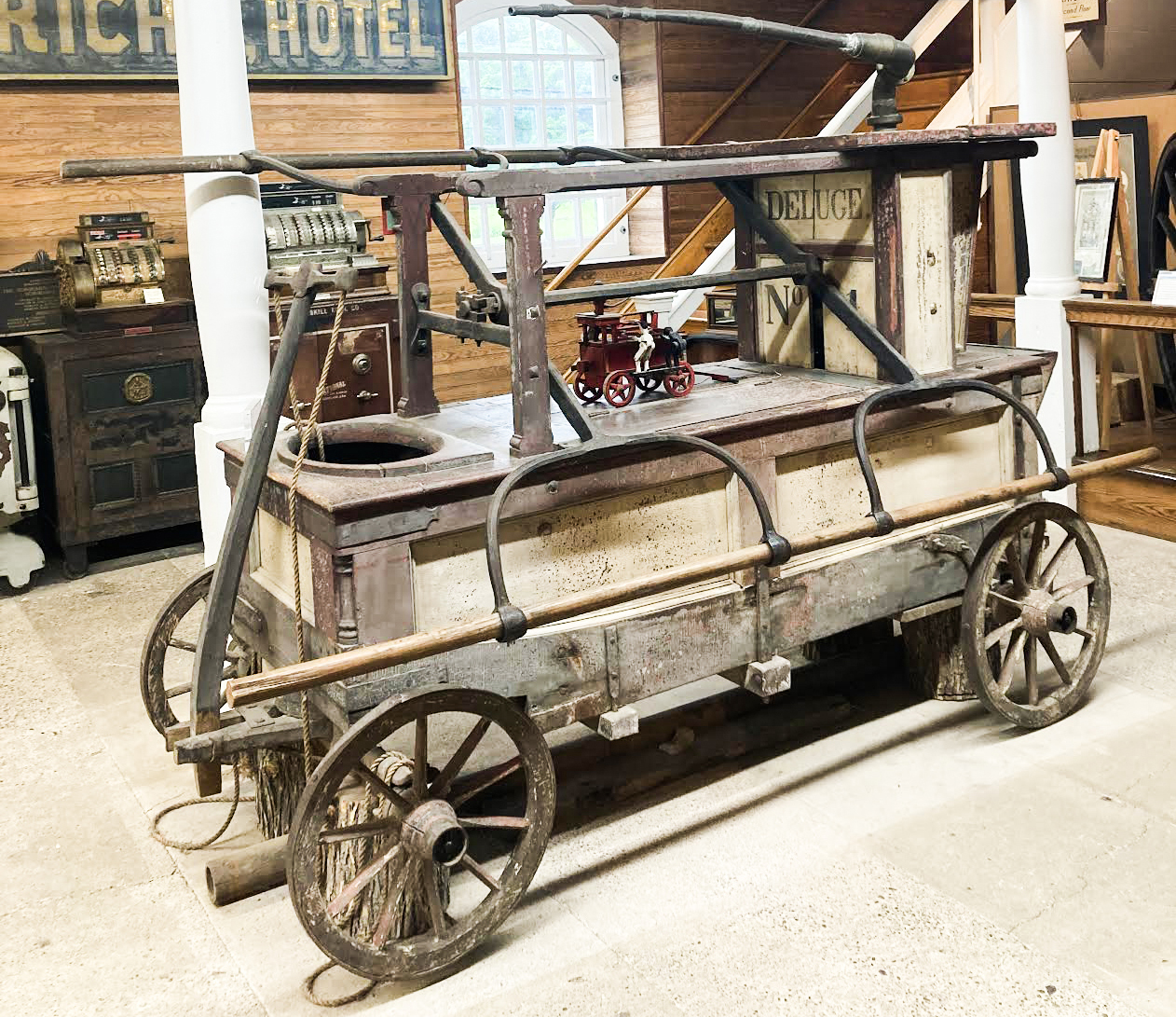 Side view of 18th century hand pumped fire engine.