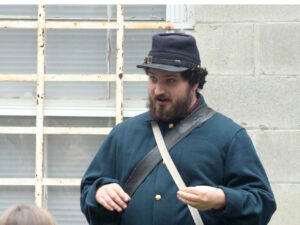 Interpreter in Civil War attire.