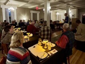 People gathered at tables.
