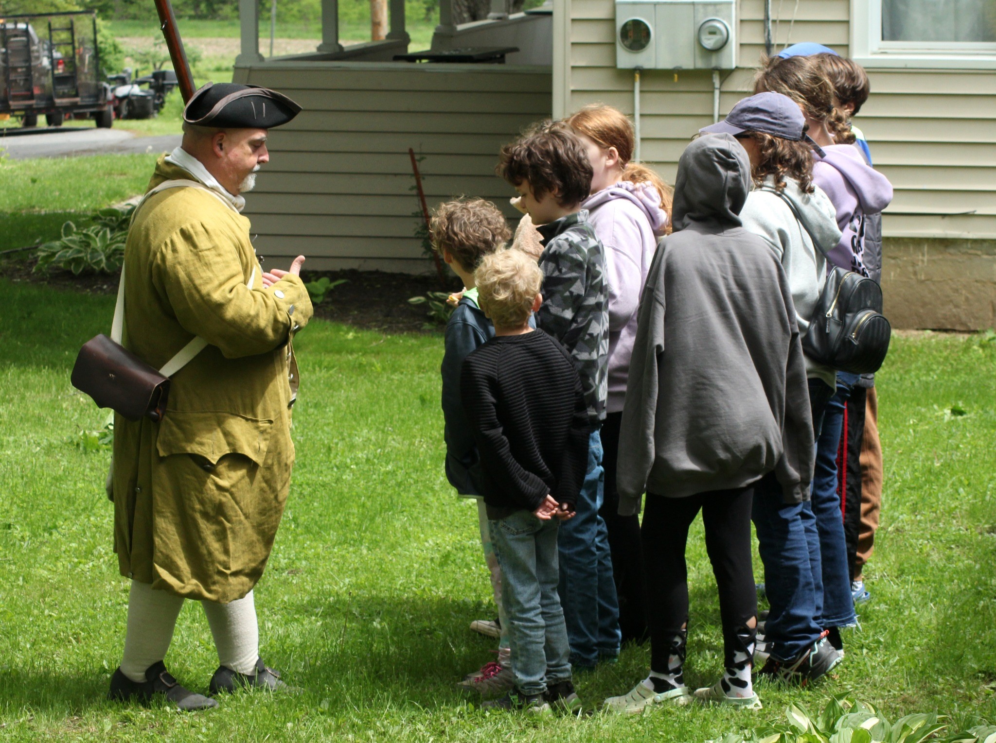 School group being taught militia training.