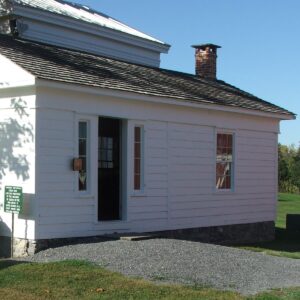 Greek Revival building, painted white.